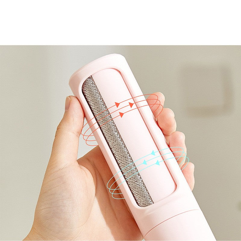 Pink pet hair remover brush with its self-cleaning holder