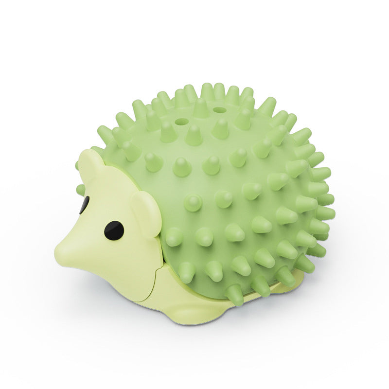 Green cat self-grooming brush with textured bristles