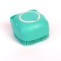 Green silicone pet bath brush on a clean white background