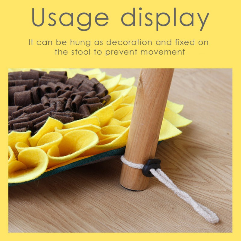 Sunflower dog snuffle mat secured on a wooden floor